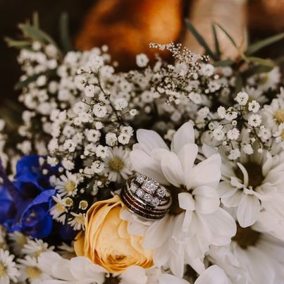 WestCoastStunner - Flower Display - Men's Antler Wedding Rings